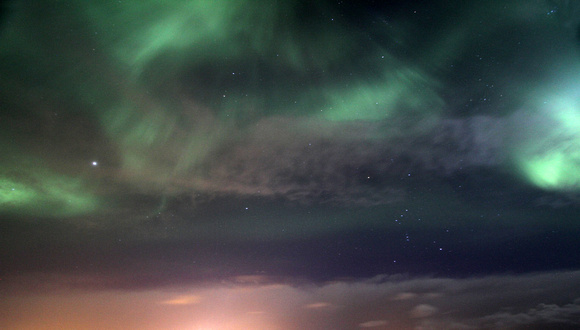 Clouds, stars and northern lights